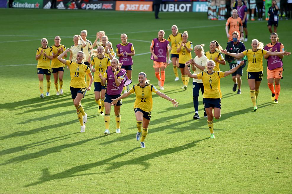 Swedish players celebrate after the game