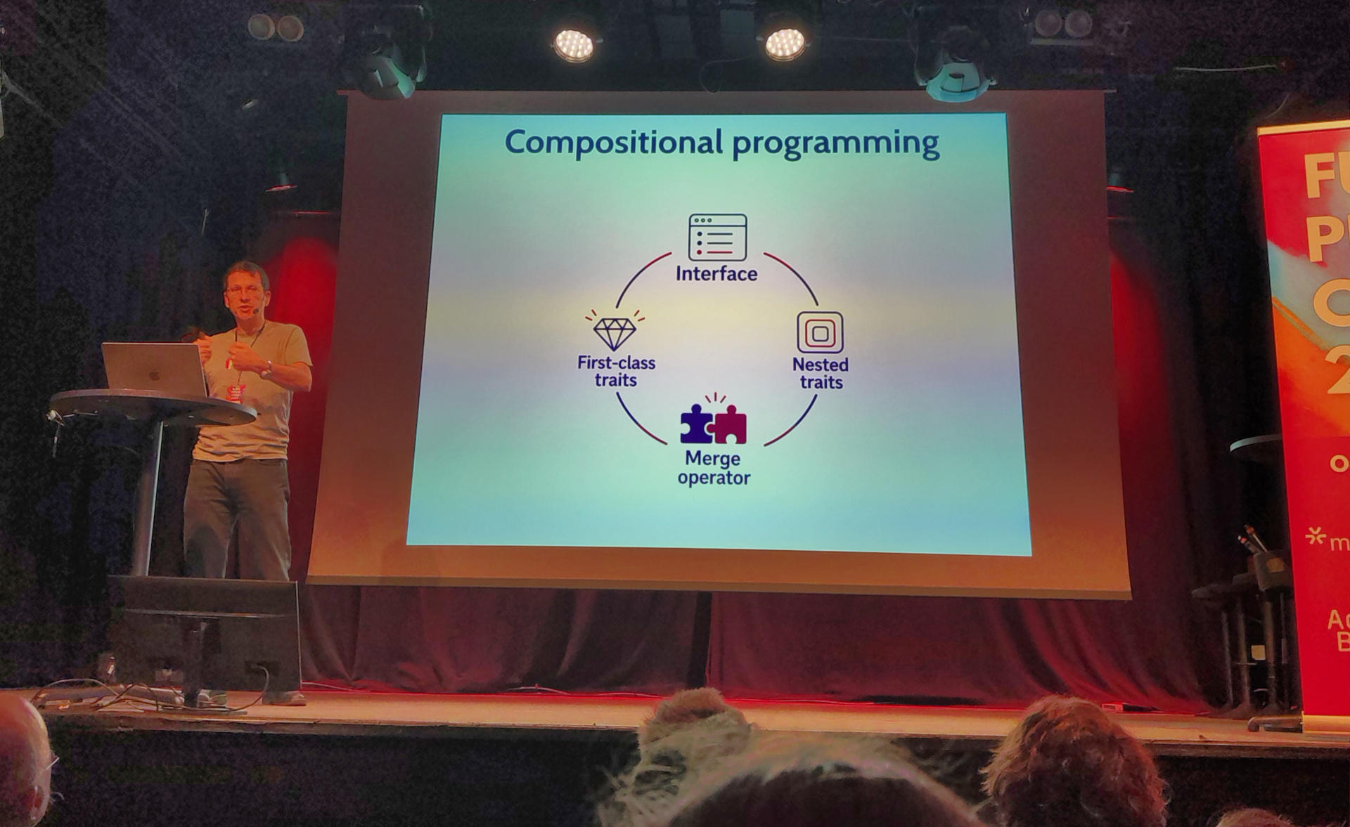 Eric presents a slide labelled "Compositional programming"