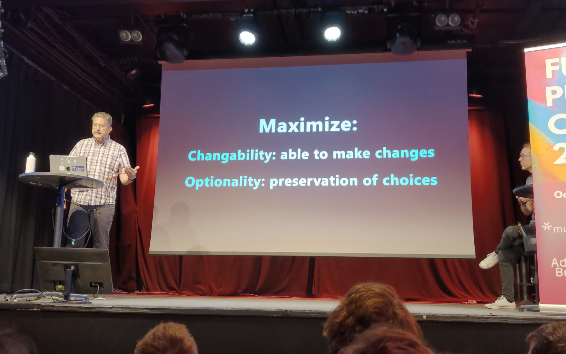 Christoph presents a slide labelled "Maximize changeability and optionality"