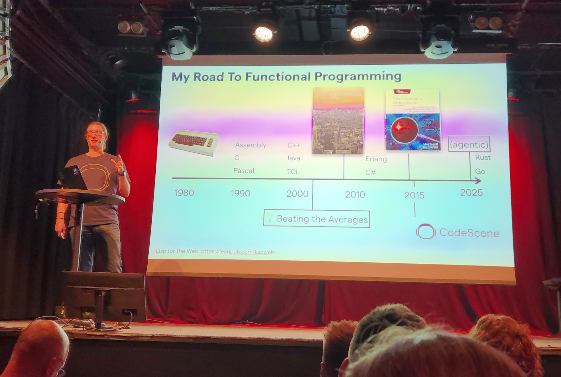 Adam presents a slide labelled "My Road To Functional Programming"